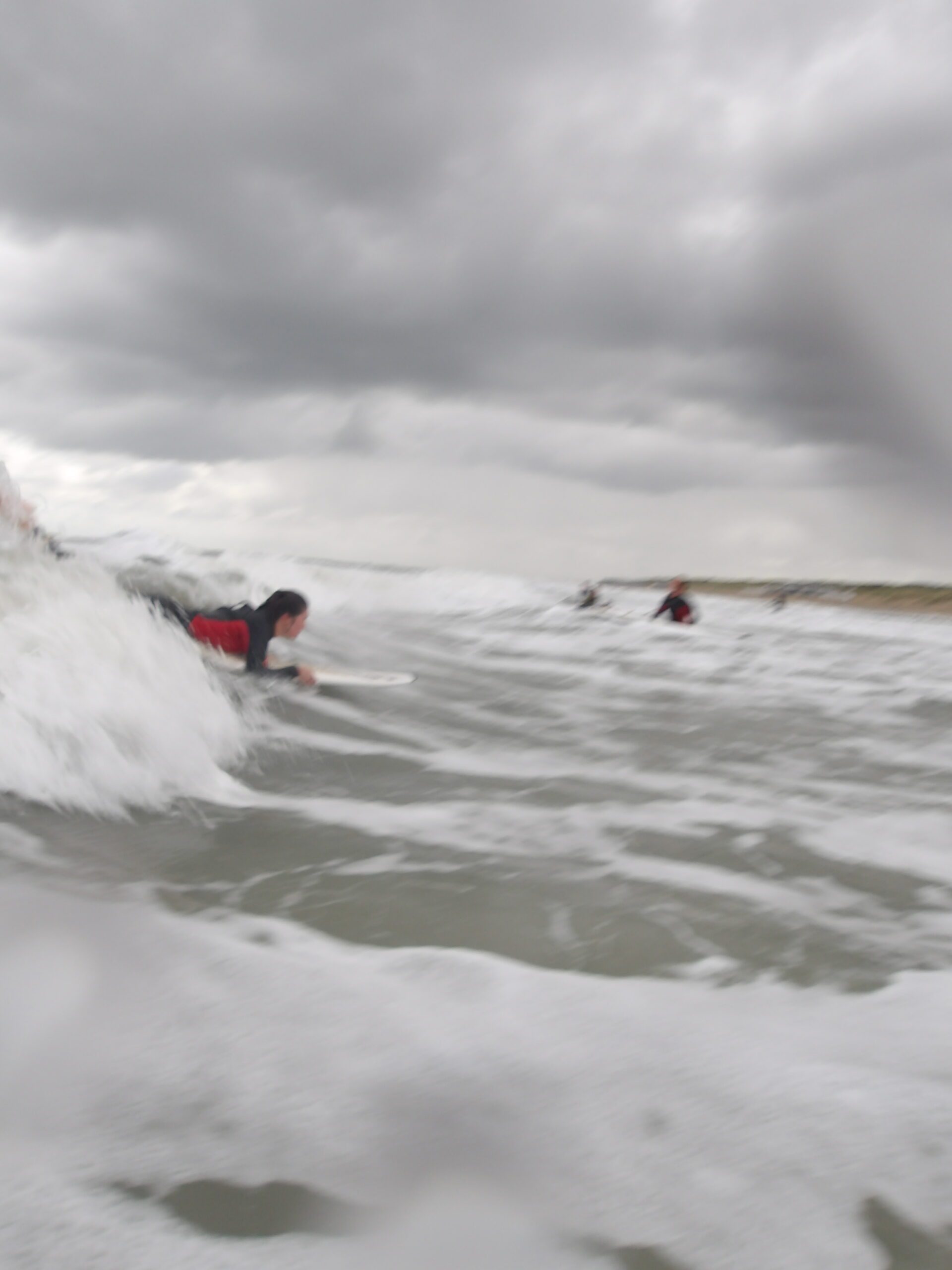 Surffoto van een HLDR teamlid